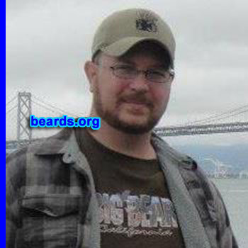 Wendall A.
Bearded since: 2011. I am a dedicated, permanent beard grower.

Comments:
Why did I grow my beard? I've always wanted a beard but was physically not able to grow one before I joined the Marine Corps. After I got out, however, I stopped shaving my face and just let it go. My wife didn't like it at first and she's still on the fence about it, but she's warming up to my beardedness. She says as long as I keep it trimmed and shaped, wash it often, and don't let it go wild, she'll let me keep it.

How do I feel about my beard? I love my beard. I wish that it were more red to show my Scottish/Irish heritage, though.
Keywords: full_beard